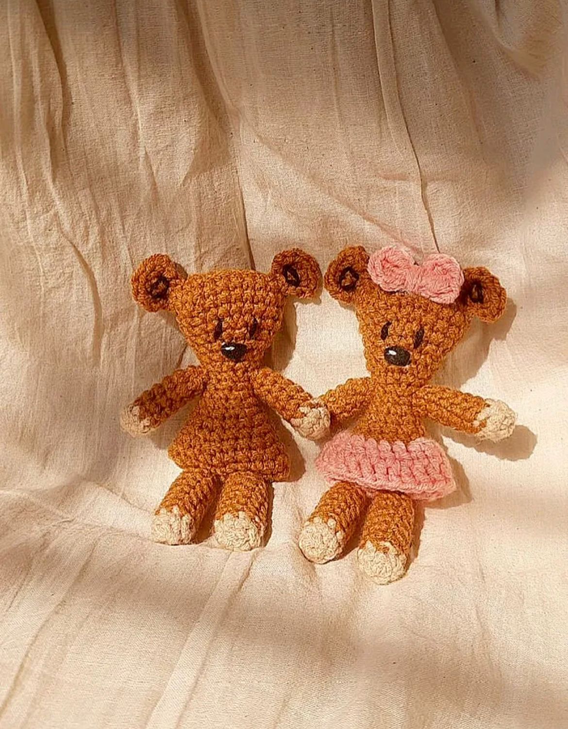 Small brown handmade crochet teddy bear keychain inspired by Mr. Bean's teddy, handcrafted amigurumi on white background.